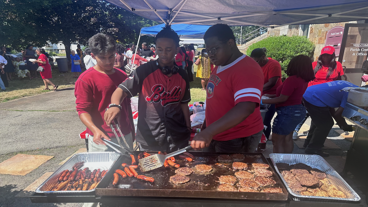 Volunteering at a church fundraiser event.